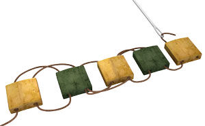 Tila beads being threaded